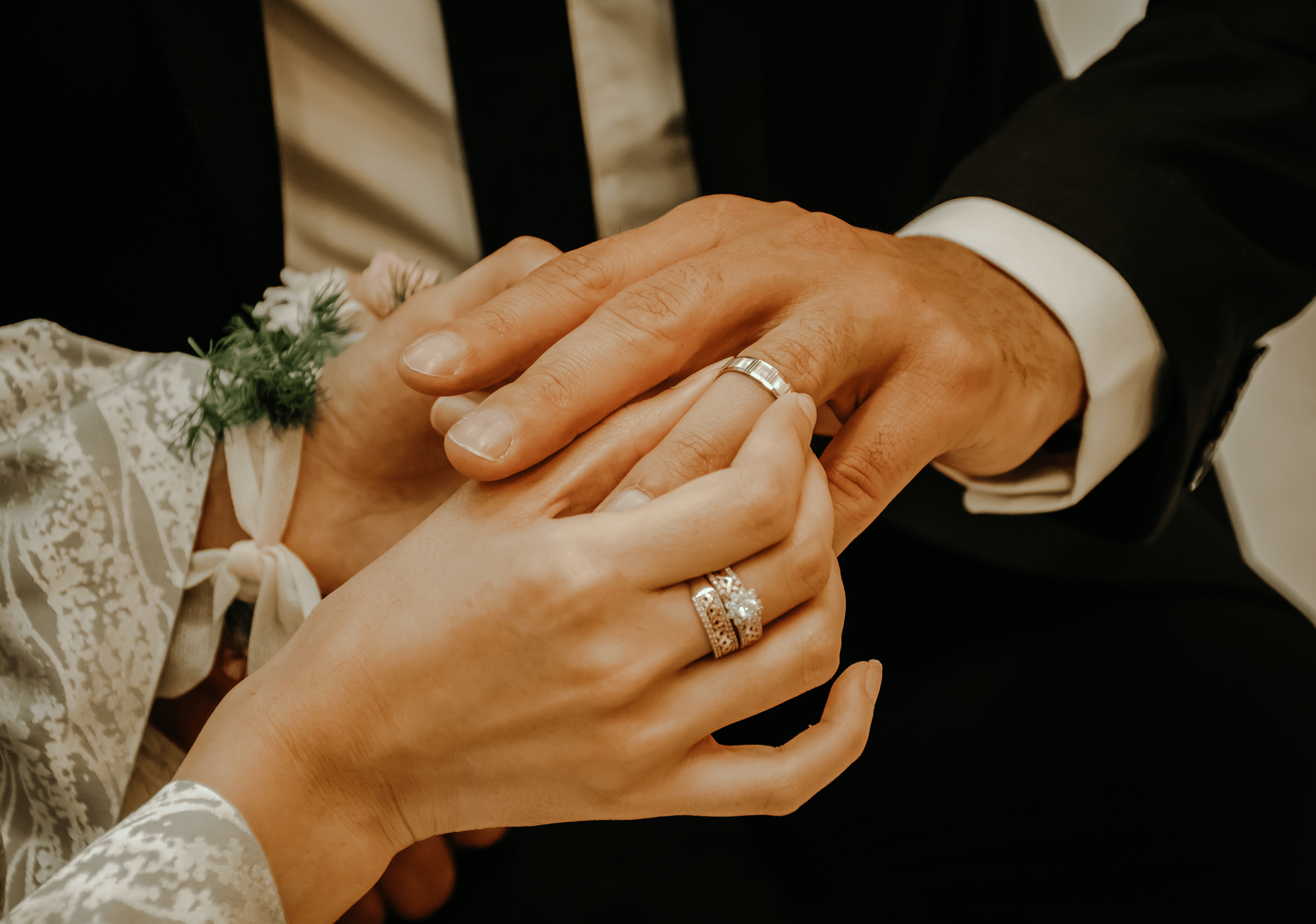 Wedding couple showing rings, wedding transportation NYC