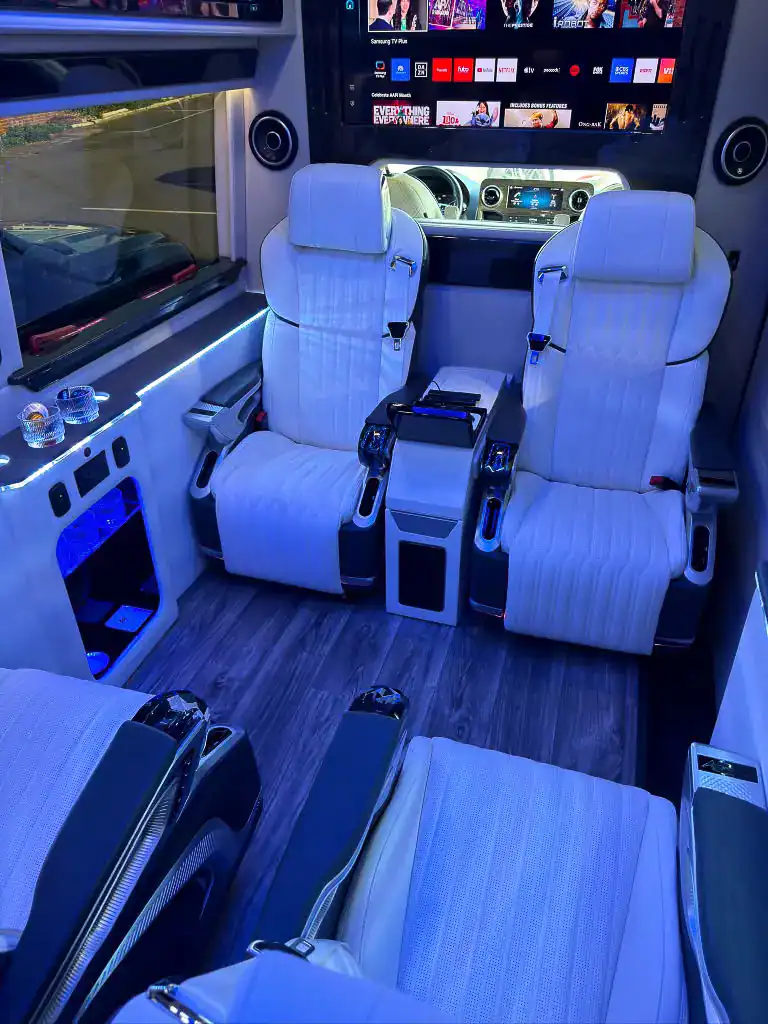 White seating inside the MUSAT Mercedes-Benz Sprinter Jet